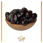 mazafati dates in a brown wooden bowl